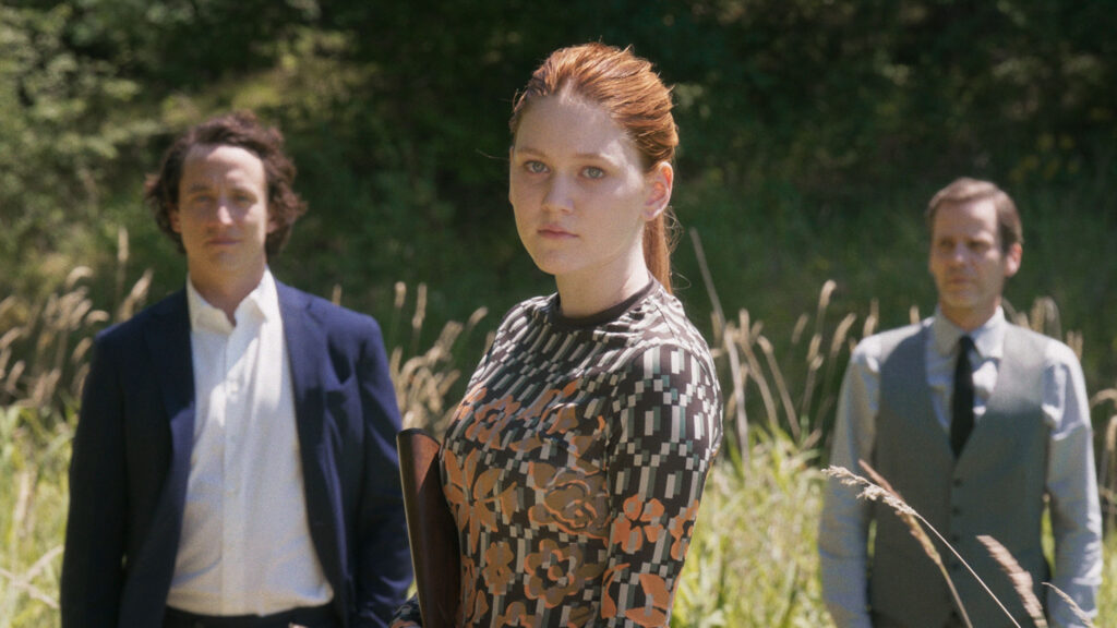 Veni Vidi Vici- Film Still- Girl flanked by two men